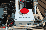 Assembly close-up photograph of Ruins in ASCII's power switch, labeled 'D3A7H-5W1TCH.' Thumbnail.