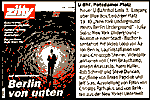 Photograph of the cover of Zitty magazine, and an excerpt of the article therein in which the 'New York Underground meets Berlin Underground' event was covered (Pub. 20020904, p.143). The precursor work to Ruins in ASCII was projected during this event at the vacant Postdamer Platz U-Bahn station. Thumbnail.